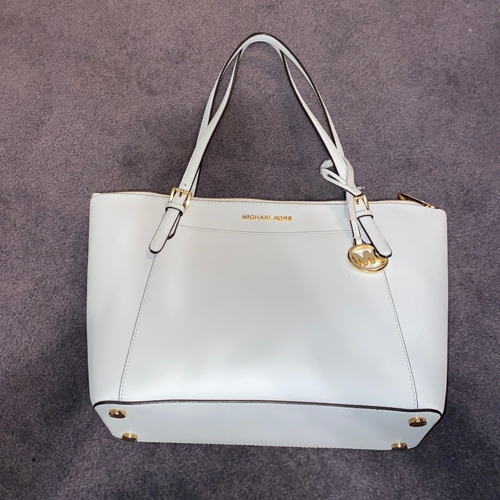 Never used white Michael Kors bag with zipper